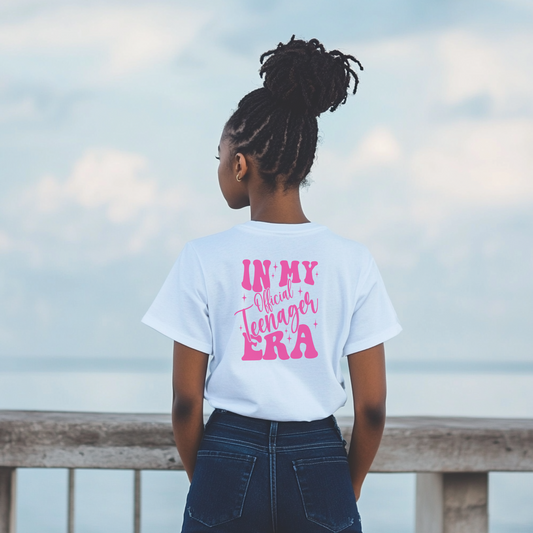 Teen girl wearing ‘In My Official Teenager Era’ birthday t-shirt, celebrating 13th birthday outdoors


